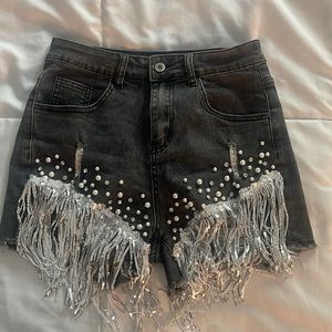 Black denim shorts with silver fringe